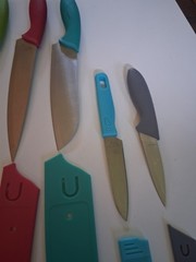 Lot Of Kitchen Kinfes 8 With Plastic Sheaths Used Made In China
