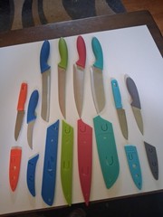 Lot Of Kitchen Kinfes 8 With Plastic Sheaths Used Made In China
