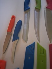 Lot Of Kitchen Kinfes 8 With Plastic Sheaths Used Made In China