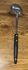 Unbranded 13″ Stainless Spoon with Black Composite Made in USA